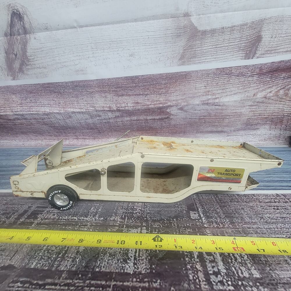 Vintage Nylint pressed steel semi car hauler trailer cream color